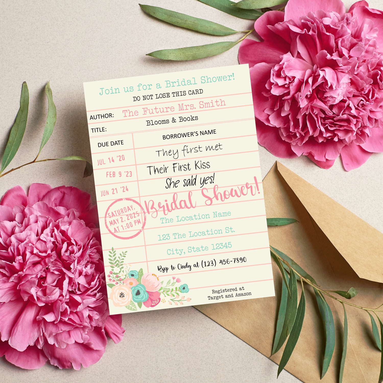 A library card themed bridal shower invitation with editable text, displayed next to pink peony flowers and a brown envelope.
